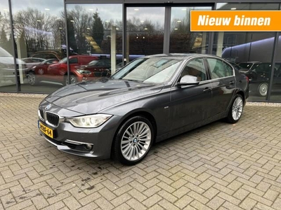 BMW 3-serie 320i 184pk Luxury,Xenon,Leer,NaviPro,Clima,Stoelverw,PDC,Dealer