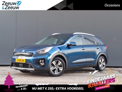 KIA NIRO 1.6i Hybrid ExecutiveLine 1e Eigenaar | Dealer onderhouden | Navi | Climate & (adaptieve) cruise control | Bluetooth | Leder interieur | Stoel & stoelverwarming | Trekhaak | Vier Seizoenenbanden | Fabrieksgarantie t/m 3-8-2027 | NAP